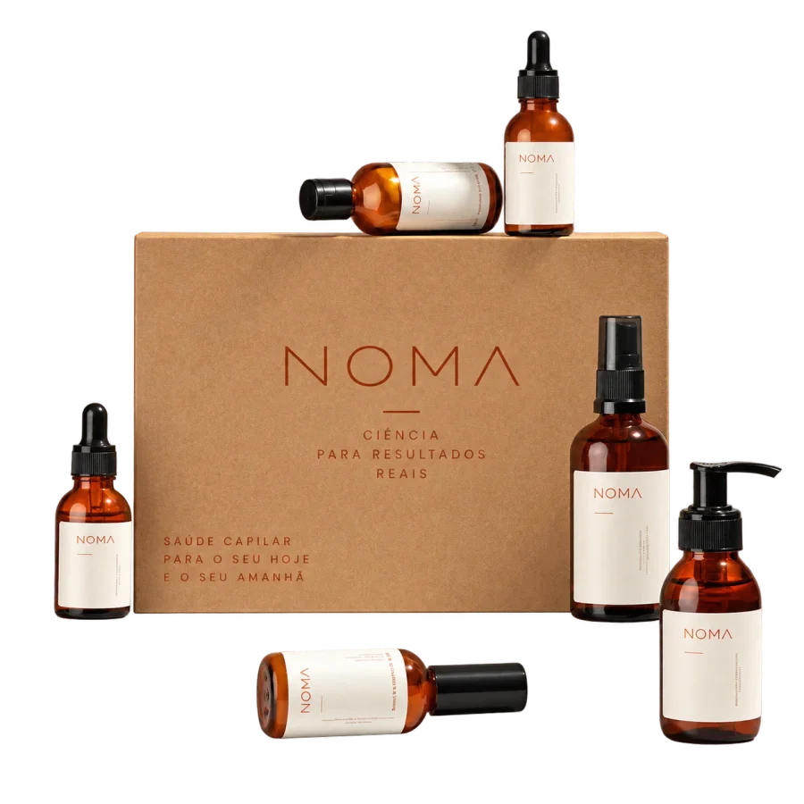 Caixa NOMA cercada por frascos de produtos NOMA